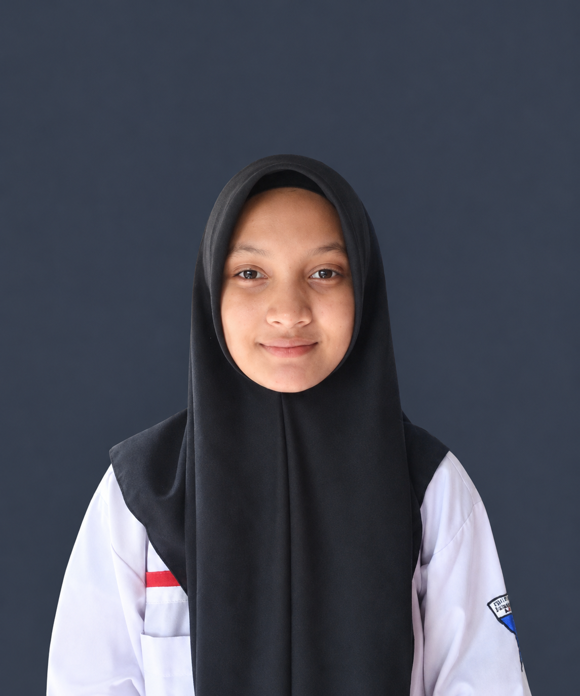 student portrait in black hijab